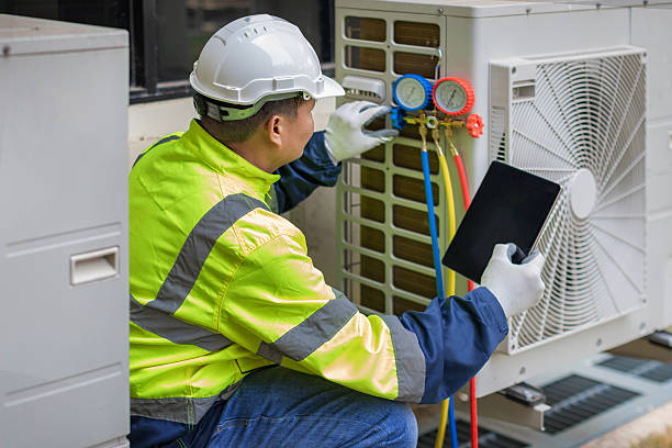 Professional Heat Pump Repair technician working in Albion, NE